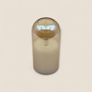 حامل شمعة زجاجي بسيط مع شمعة كريمية