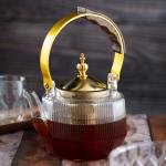 Luxury undulating glass teapot with gold accents and wooden handle