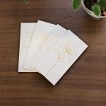 أظرف بيضاء أنيقة بنقوش زهرية ذهبية