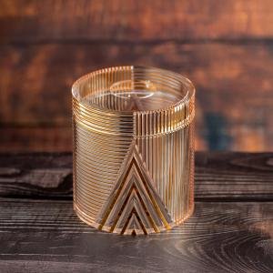 Golden-Tinted Round Acrylic Tissue Box with Geometric Design