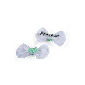 مشبك شعر مزدوج الطبقات مع فيونكة صغيرة لمسة من الأناقة والمرح