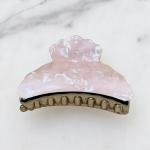 مشبك شعر بصدف رخامي لامع بحواف منحوته وقبضة ذهبية