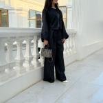 طقم جاكيت قصير وبنطال واسع نسائي